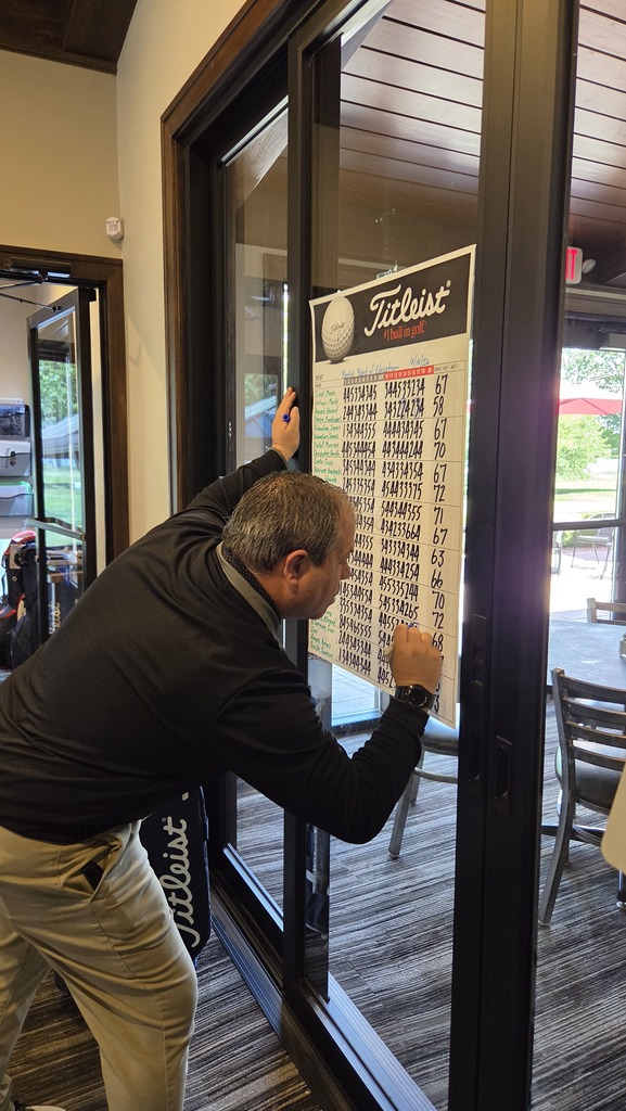 Image from the golf outing - tallying the scores