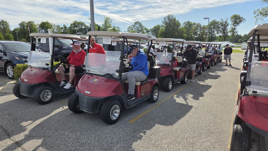 Image from the golf outing - golf lined up with players and ready to go!