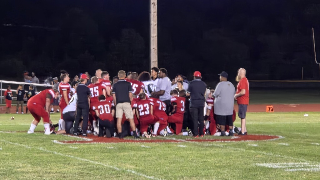 Players taking a moment of silence