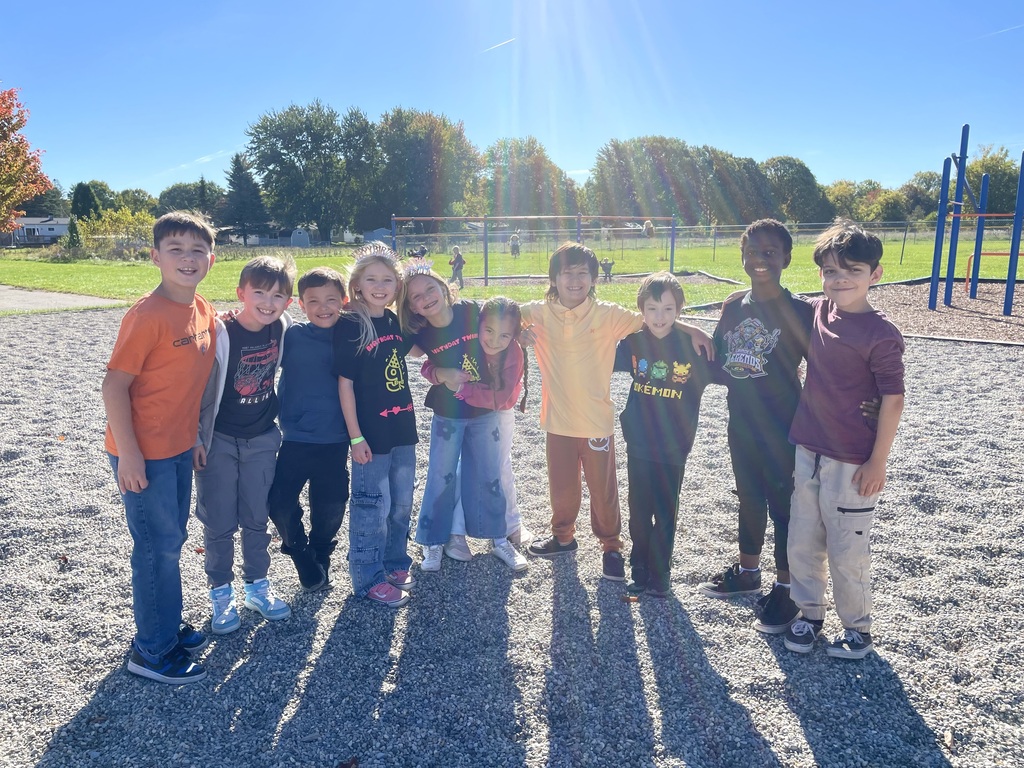 Students posing for picture while at recess