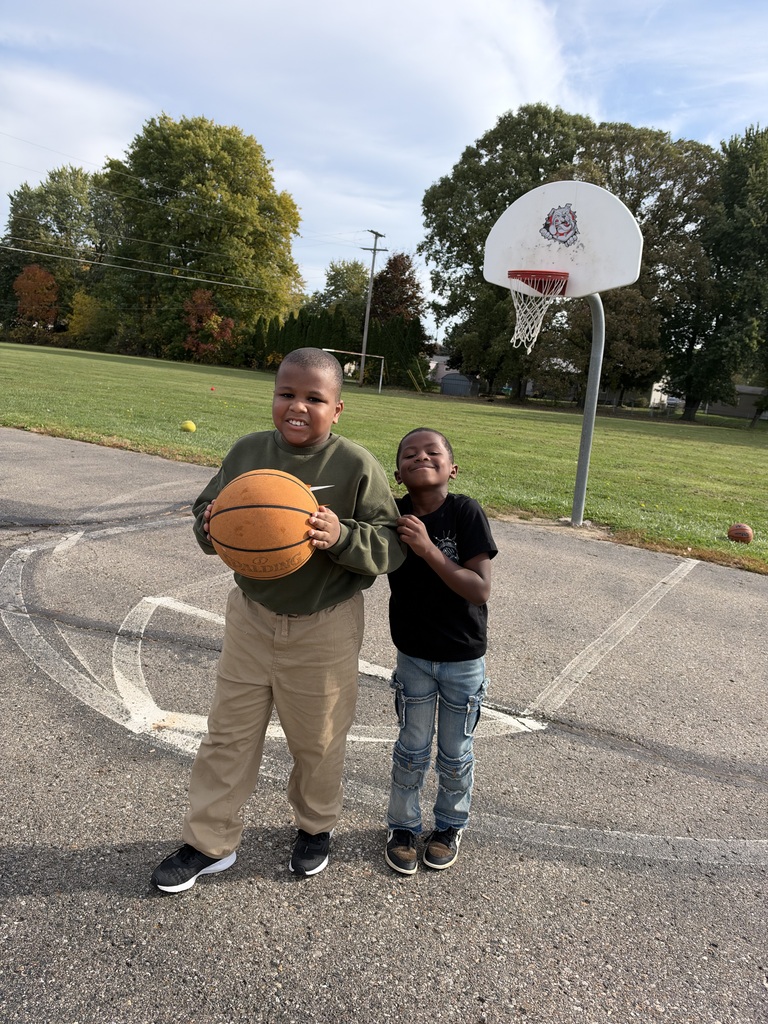 Boys playing basketball