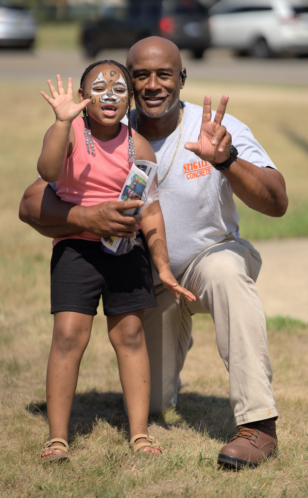 man and girl at Back to School bash