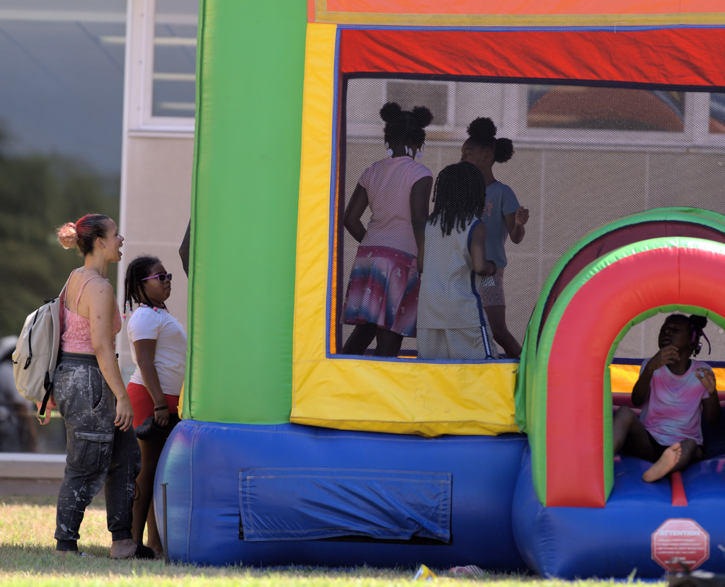 children on a bouncy house