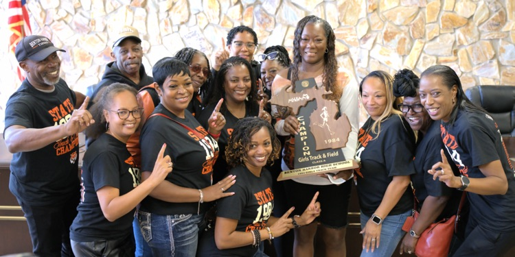 1984 Girls Track State Champions with their new trophy