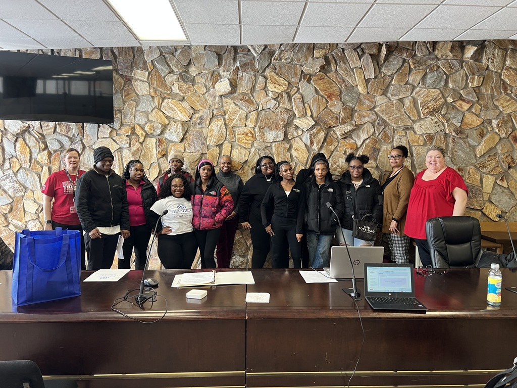 The Berrien Community Foundation working with High School seniors to submit their scholarship applications. 