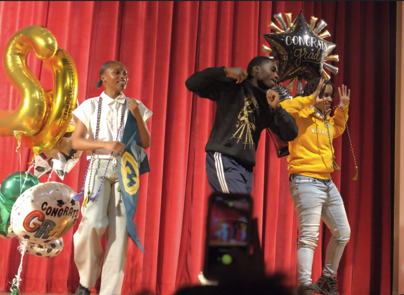 BHHS Students celebrating their decisions on stage during Senior Decision Day. 
