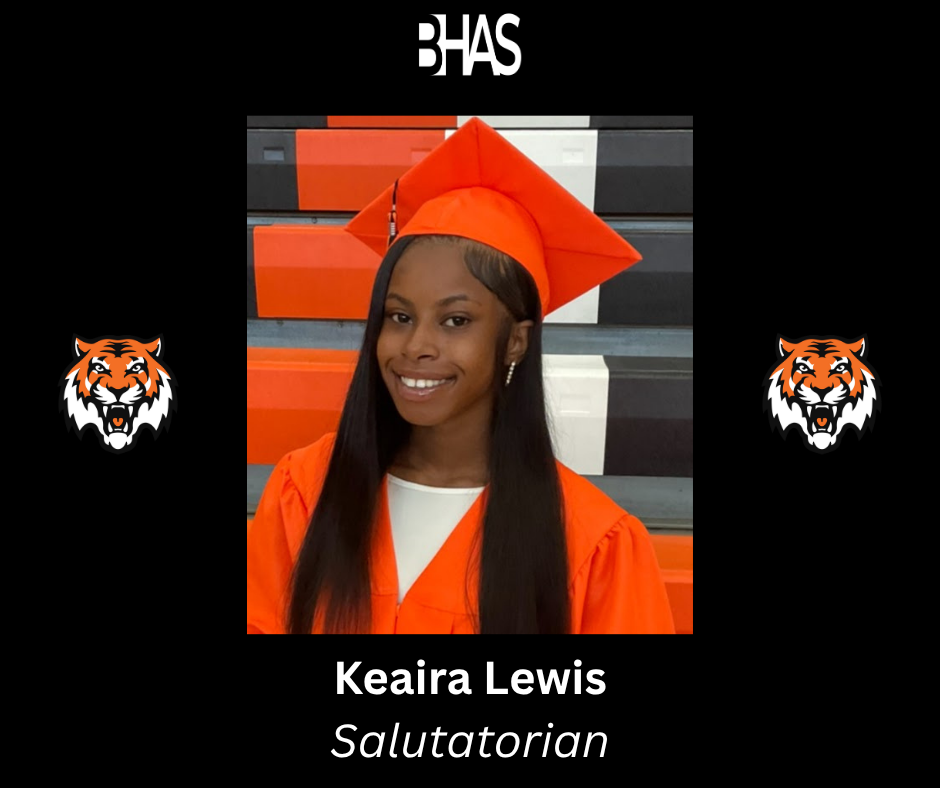 A graphic with a black background featuring a square photograph of a smiling woman, wearing an orange graduation cap and gown. She is posing in front of orange, black, and white gymnasium bleachers. Below the photo, white text reads "Keaira Lewis" and italicized text reads "Saltutarian". The Benton Harbor Area Schools acronym logo "BHAS" is centered at the top, and two identical orange tiger head logos flank the photo on the left and right.