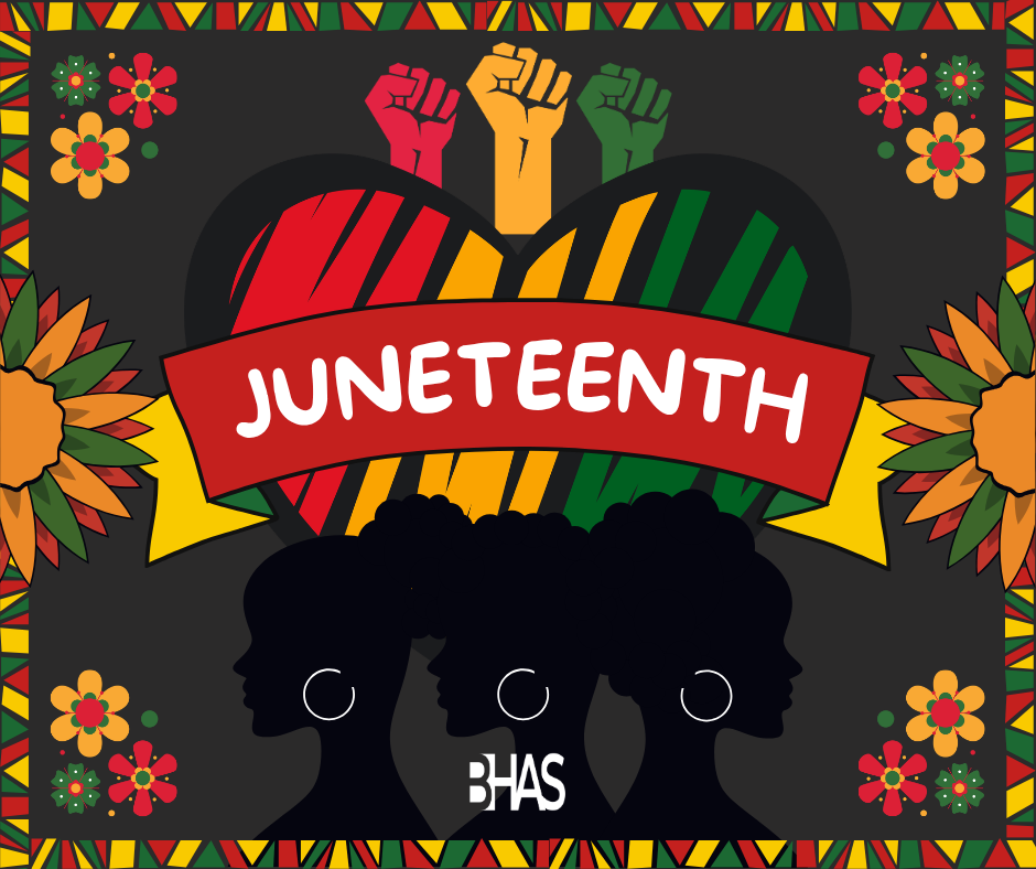 A Juneteenth commemorative graphic for Benton Harbor Area Schools. The design features three raised fists in red, gold, and green above a large heart with red, gold and green colored stripes. A red banner across the center reads "JUNETEENTH" in white letters. Below the banner are the black silhouettes of three women and the BHAS logo is at the bottom center. The entire image is framed by a colorful geometric pattern with floral accents in the corners.