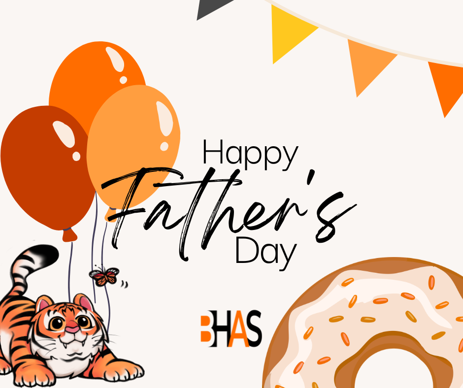 A Father's Day greeting graphic from BHAS. The design features a cute cartoon tiger cub in the bottom left corner next to a cluster of orange and brown balloons. A large frosted donut with orange sprinkles is in the bottom right. The center text reads "Happy Father's Day" in a mix of sans-serif and script fonts, with the BHAS logo below it. A string of yellow and orange triangular banner hangs in the top right corner.