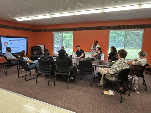 New BHAS educators participating in a group discussion during New Teacher Orientation.