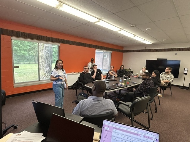 New BHAS educators participating in a group discussion during New Teacher Orientation.