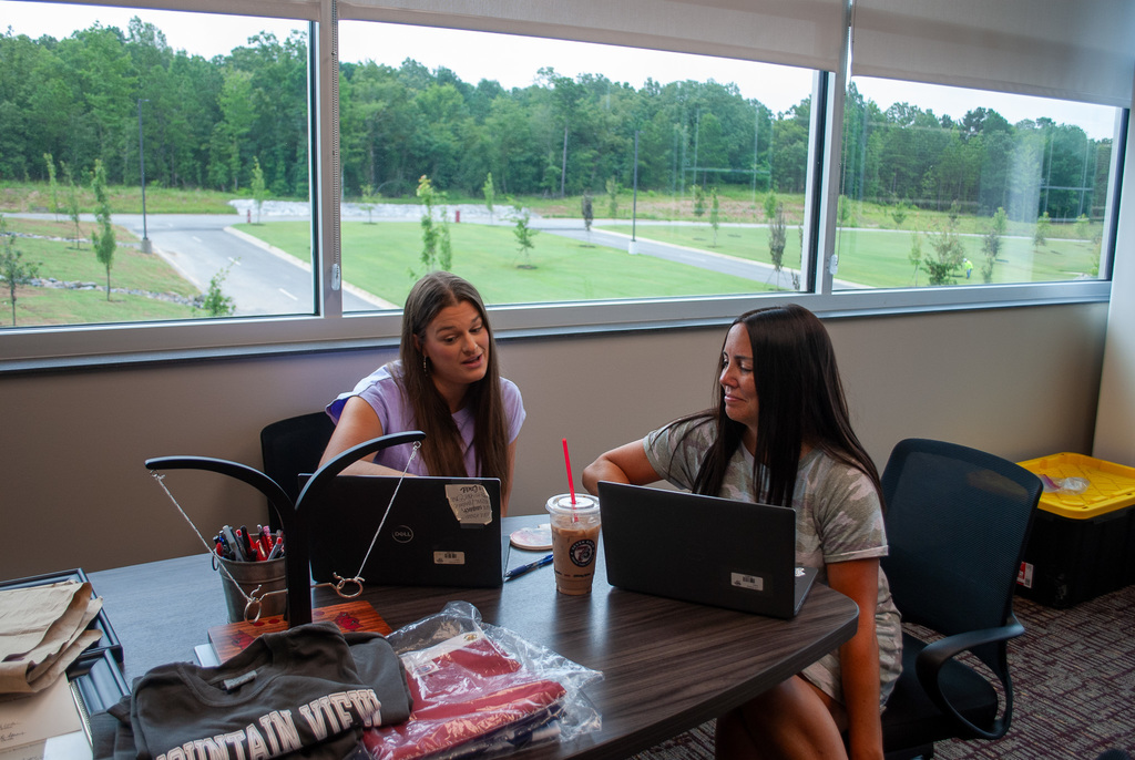 Mrs. Dodson and Mrs. Butler creating schedules