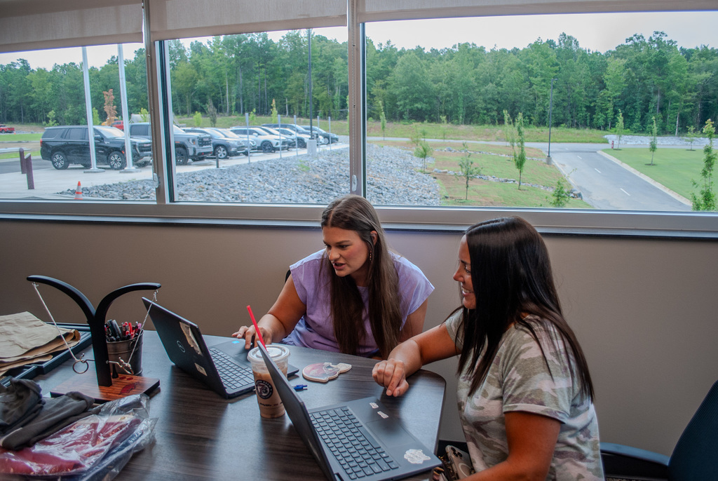 Mrs. Dodson and Mrs. Butler creating schedules