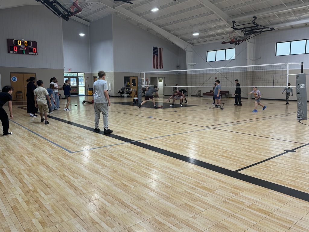 Students in PE participate in a game called Bean Bag Toe Tag