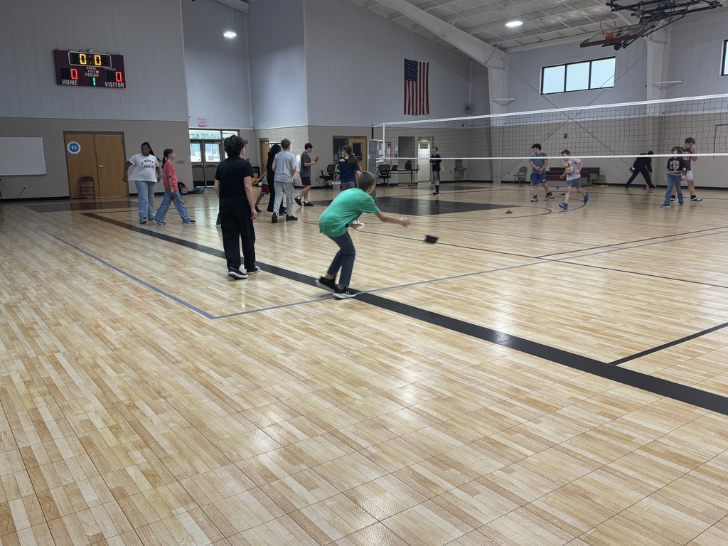 Students in PE participate in a game called Bean Bag Toe Tag