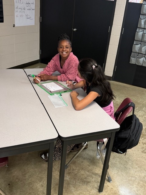 Students are playing games to reinforce their learning for the week.