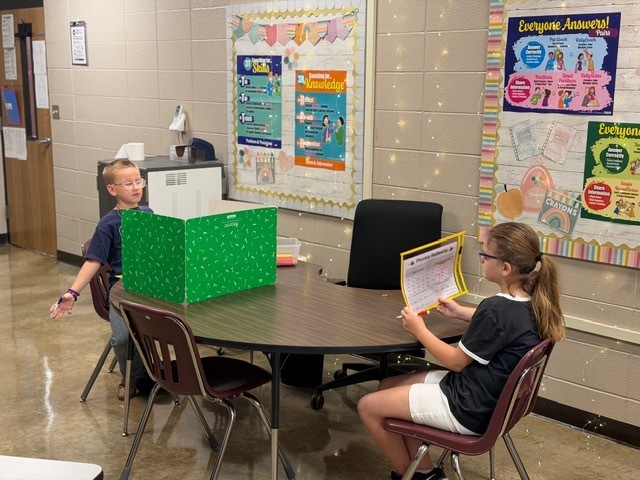 Students are playing games to reinforce their learning for the week.