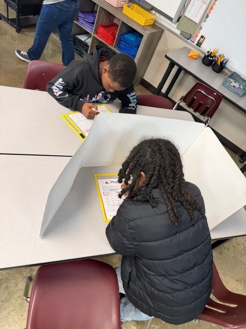Students are playing games to reinforce their learning for the week.