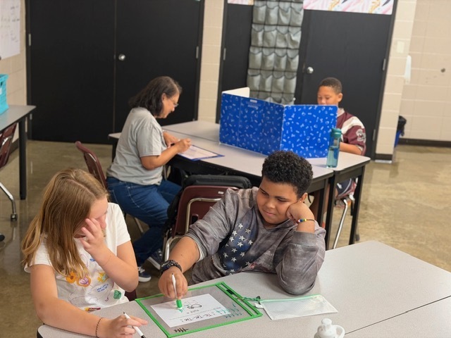 Students are playing games to reinforce their learning for the week.