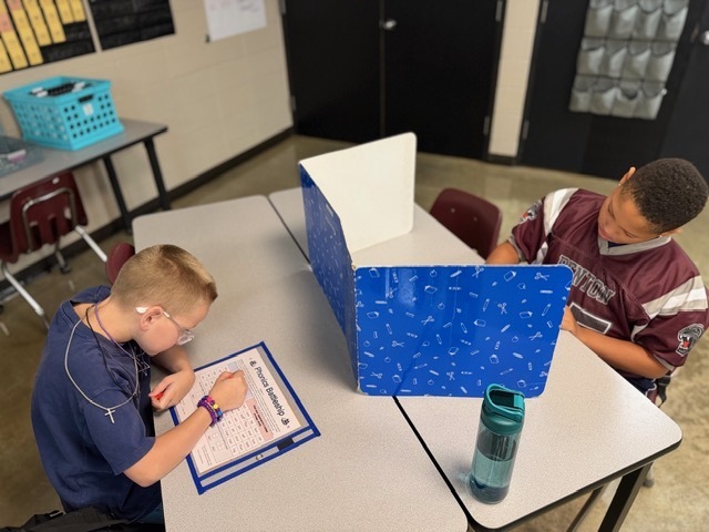Students are playing games to reinforce their learning for the week.
