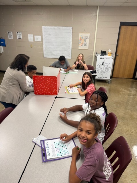 Students are playing games to reinforce their learning for the week.