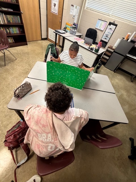 Students are playing games to reinforce their learning for the week.