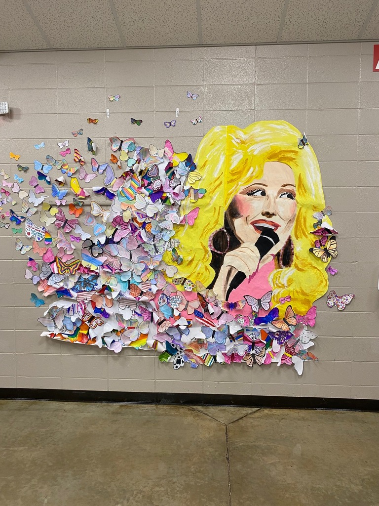 The Dolly Parton Memorial at BMS. It features a large painted Dolly Parton with individual butterflies that were created by the students of BMS