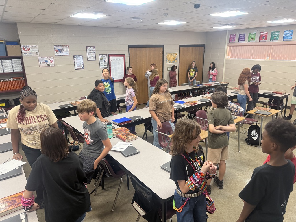 Students up walking around to work together in Mrs. Langley's class