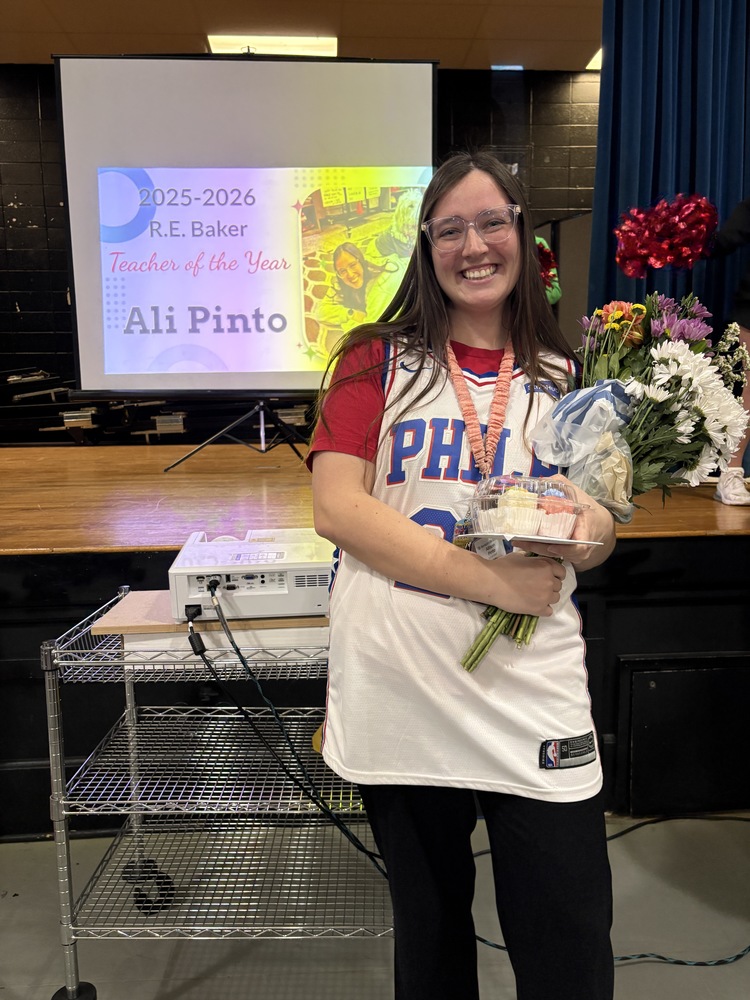 Mrs. Pinto with flowers