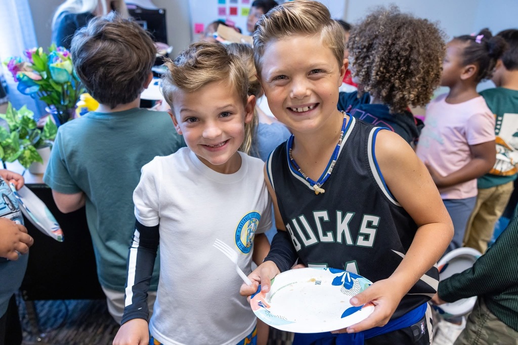 Students eating pancakes 