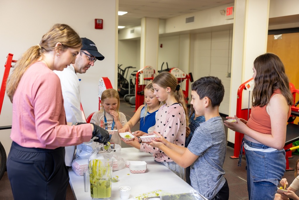 Students making guacamole dip