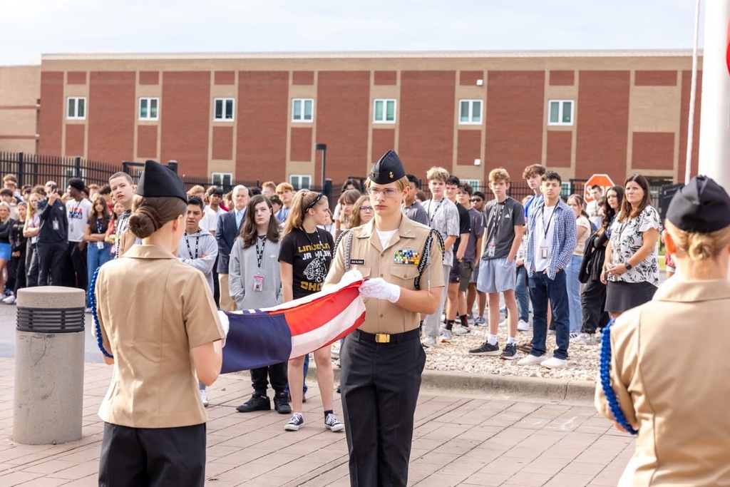 Students raise the Freedom Flag on 9/11
