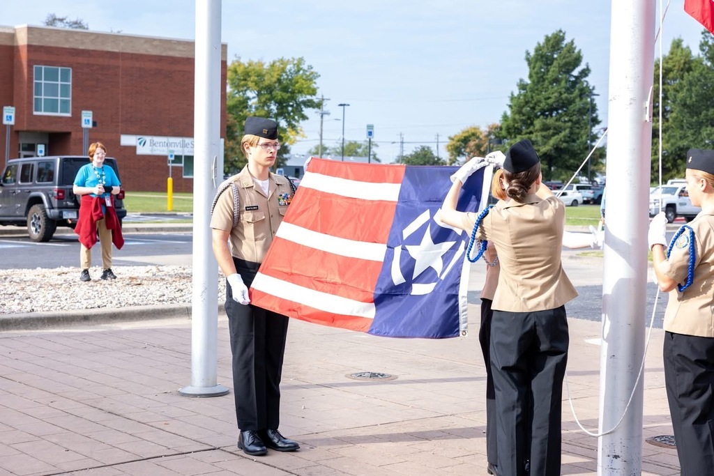 Students raise the Freedom Flag on 9/11