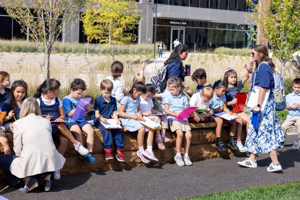 Students studying on the Walmart home campus