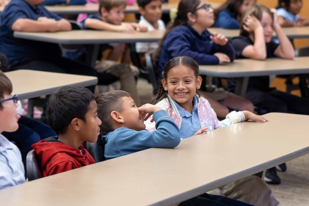 Students Cheering for Diary of a Wimpy Kid Author