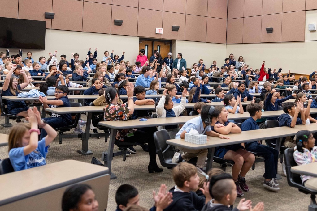 Students Cheering for Diary of a Wimpy Kid Author