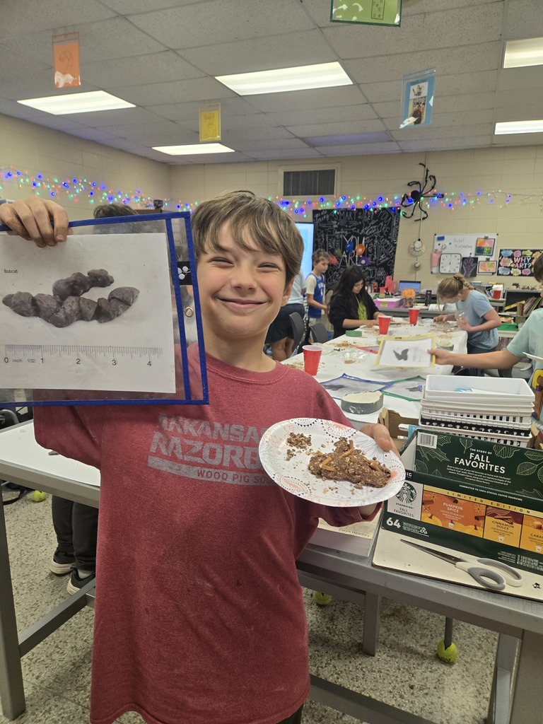 Outdoor Field and Stream recreating and identifying animal skat