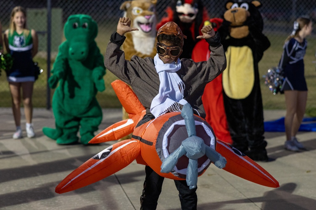 Student participating in the mascot dance off at Tailgate Together