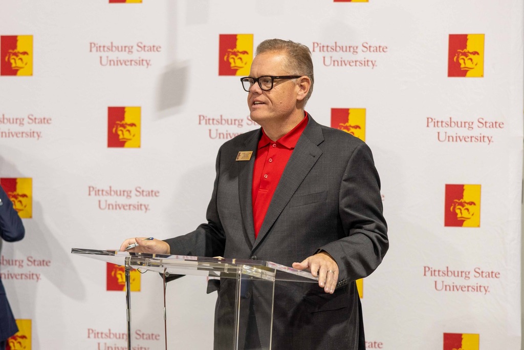 Dr. Karl Stumo from Pitt State speaking at a news conference