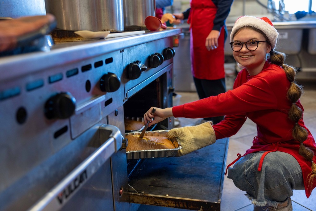 Spanish Club students preparing a meal