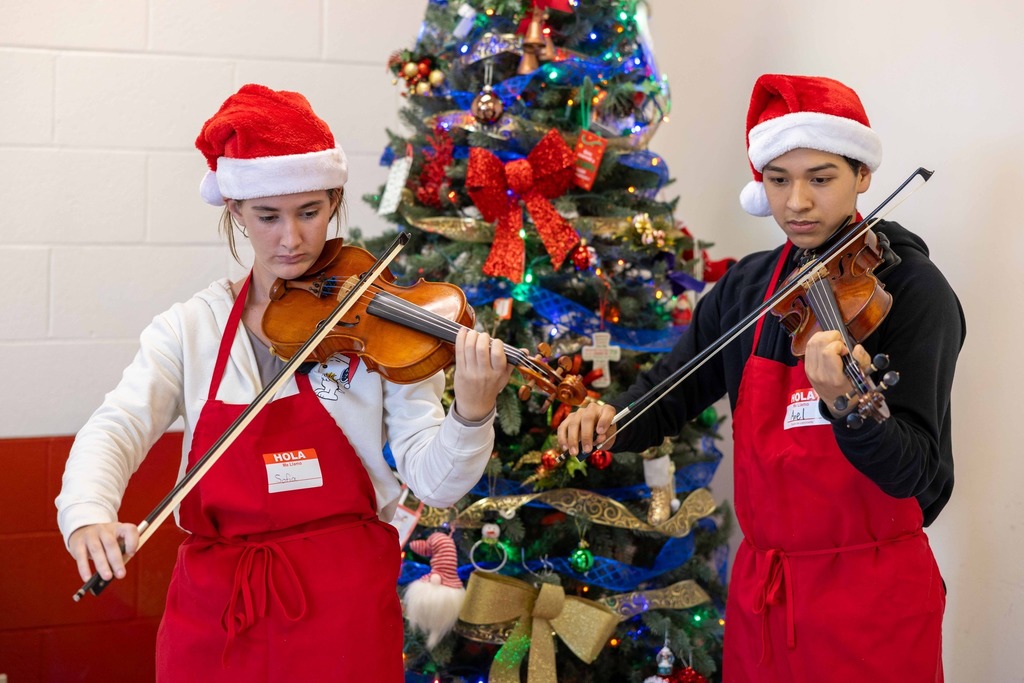 Spanish Club students playing violin