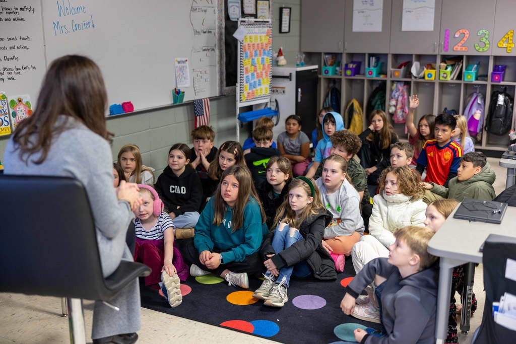 Walmart Associate Speaking to Thomas Jefferson Leadership Academy Students