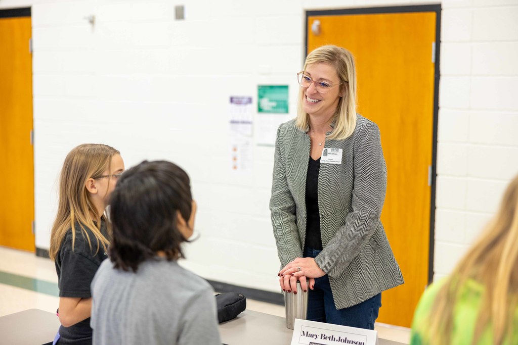 Walmart Associate Speaking to Thomas Jefferson Leadership Academy Students