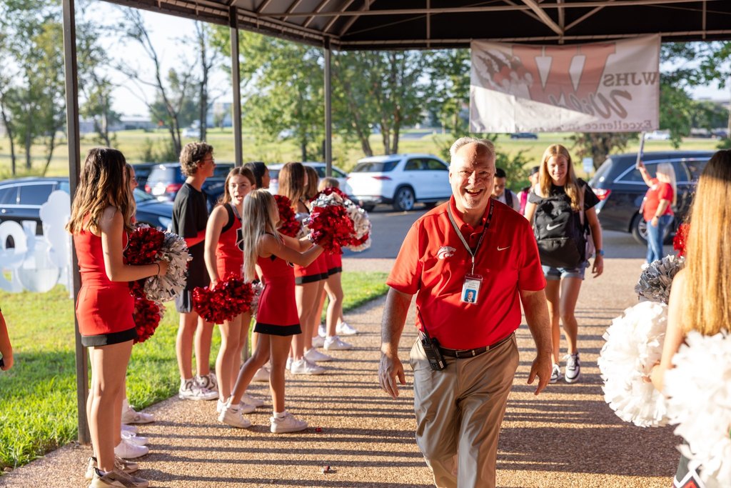 Principal Walking Into School on First Day