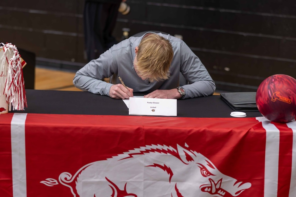 Student-athlete signing with the University of Arkansas