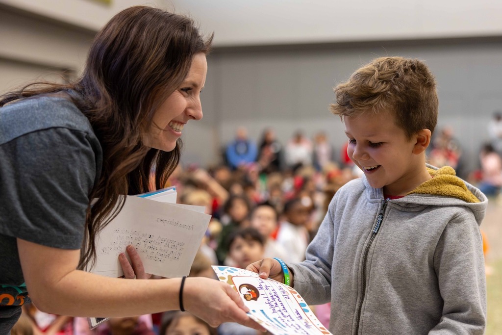 Student Receiving an Award at Osage Creek Elementary