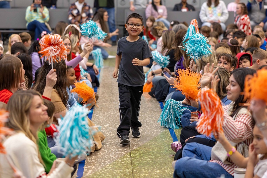 Student Receiving an Award at Osage Creek Elementary