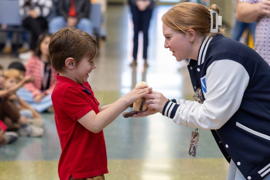Student Receiving an Award at Osage Creek Elementary