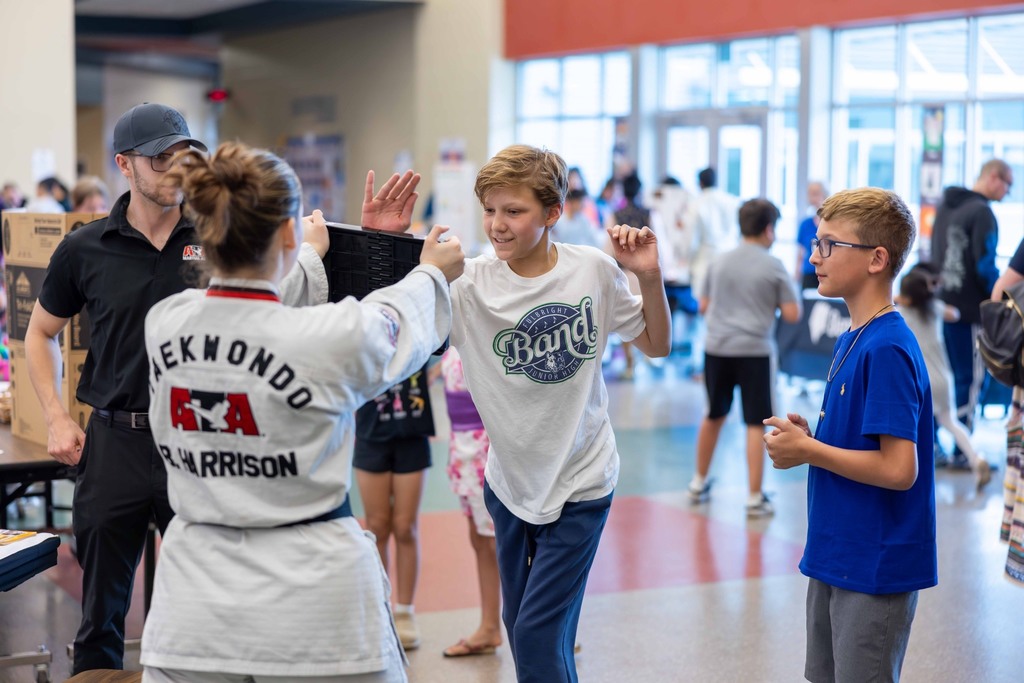 Student breaking a taekwondo board