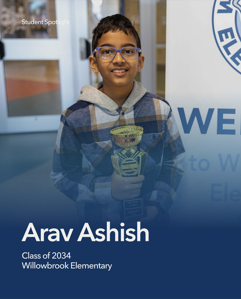 Willowbrook Elementary Student Holding A Trophy